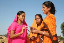 3 Indian women discussing reproductive health Source - Institute for Reproductive Health, Georgetown University